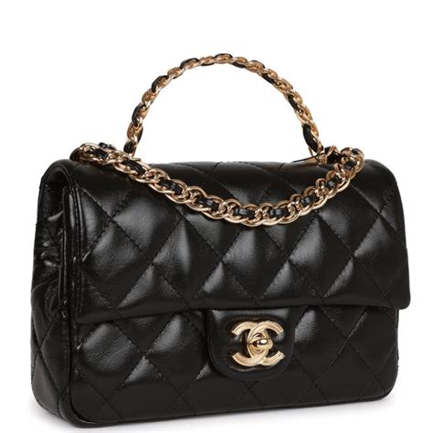 chanel flap with handle.